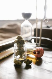 cannabis flowers in a jar